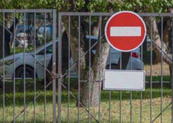 no entry sign on closed gate