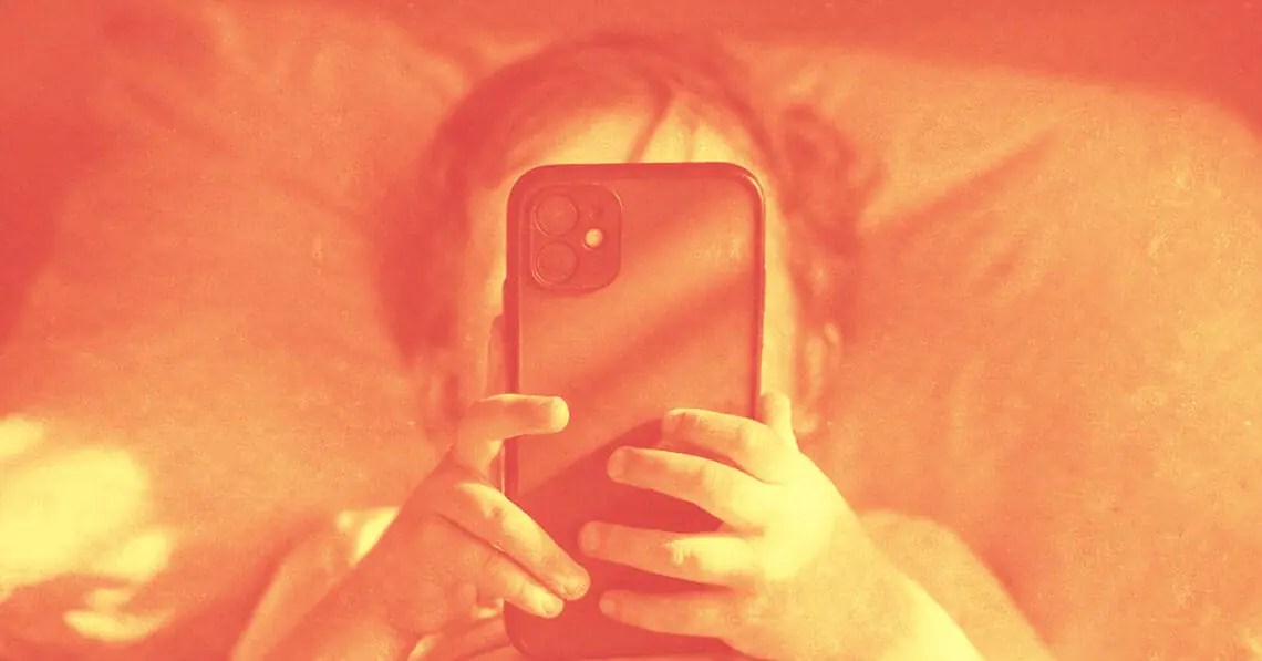 small child using smartphone
