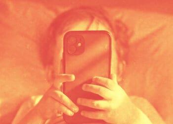 small child using smartphone