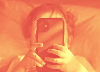 small child using smartphone