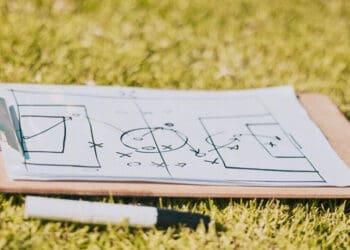 sports gameplan on clipboard