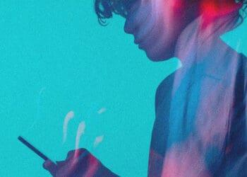 teen looking at smartphone