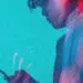 teen looking at smartphone