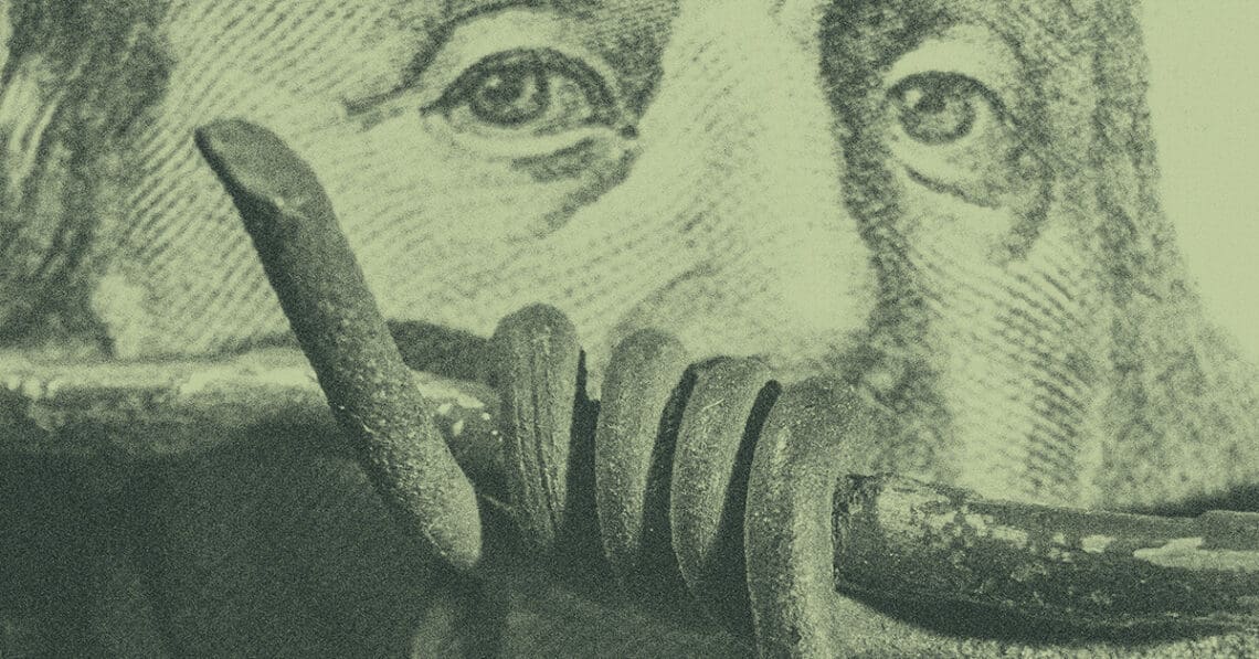 barbed wire hundred dollar bill sanctions concept