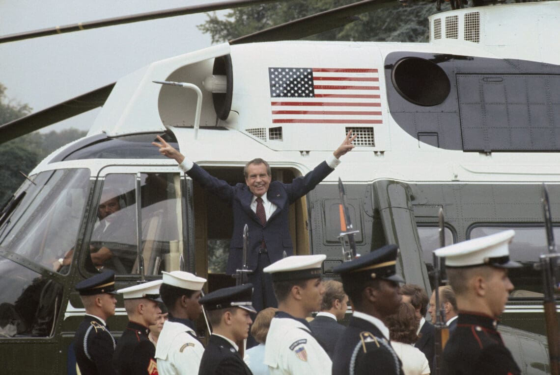 Richard Nixon Giving "V" Sign After Resignation