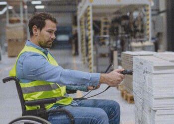 employee in wheelchair scanning bar codes