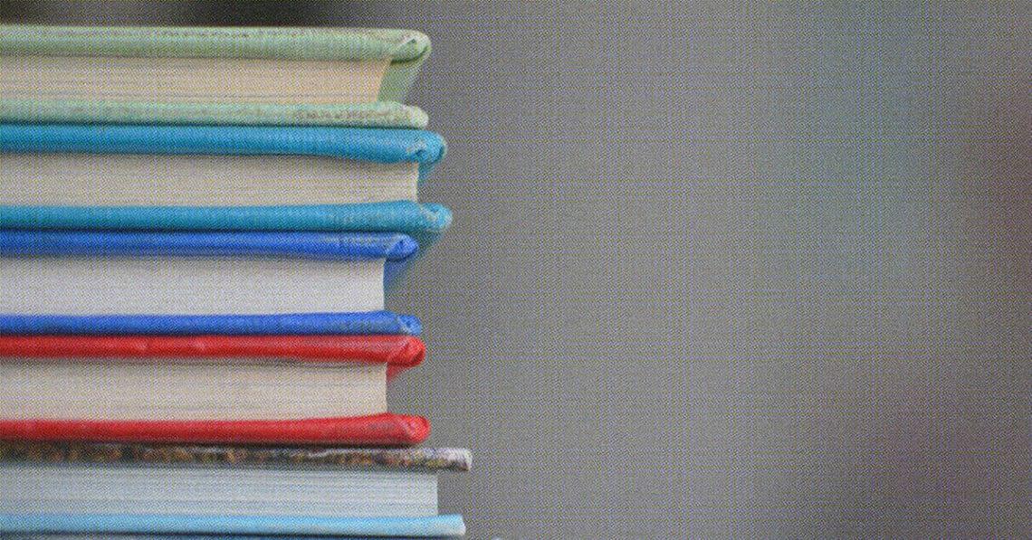 stack of hard bound books