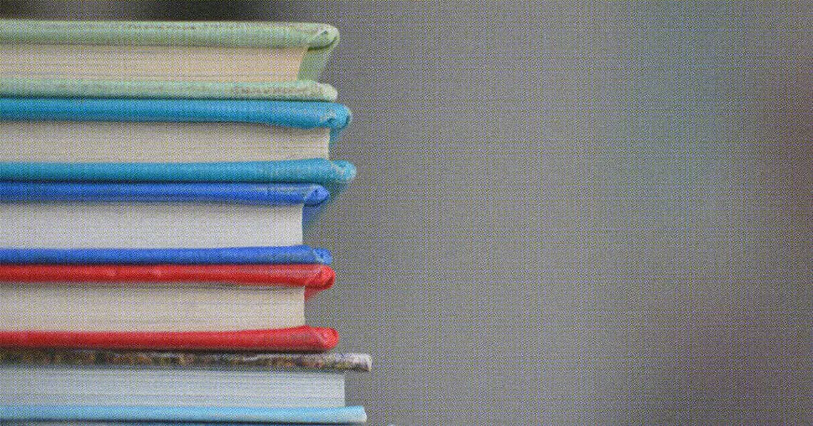 stack of hard bound books