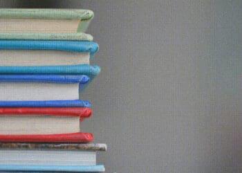 stack of hard bound books