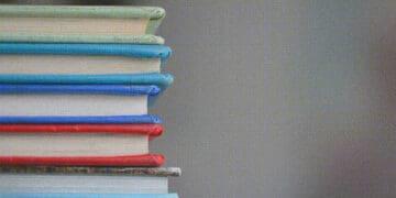 stack of hard bound books