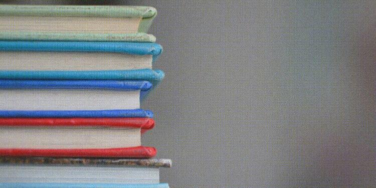stack of hard bound books