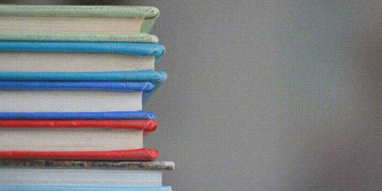 stack of hard bound books