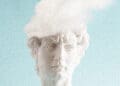 inner critic concept ancient head with cloud