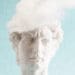 inner critic concept ancient head with cloud
