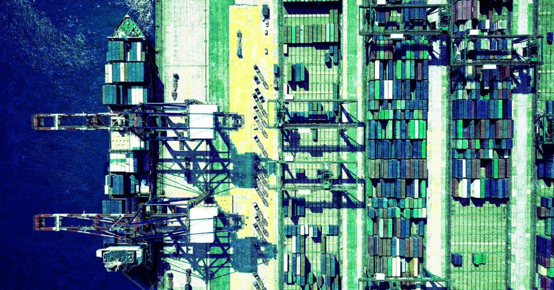 shipping containers in port aerial view