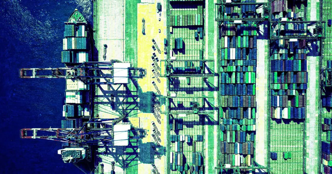 shipping containers in port aerial view