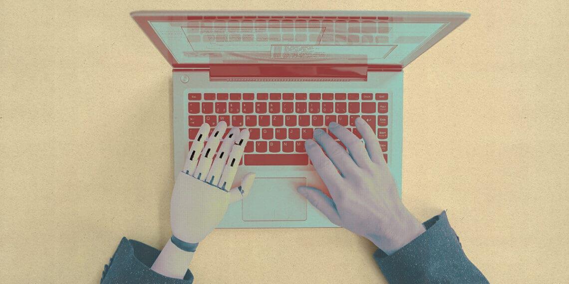 computer and human arms at laptop