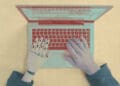 computer and human arms at laptop