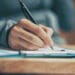 hand checking off checklist