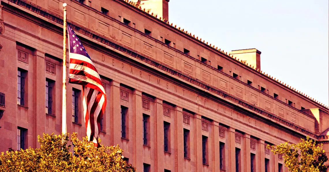 us doj building with flag