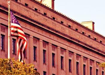 us doj building with flag