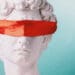 blindfolded statue