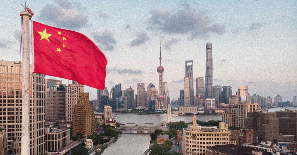 chinese flag flying over shanghai