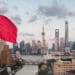 chinese flag flying over shanghai