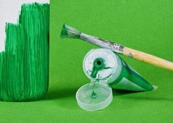 greenwashing painting white bottle concept