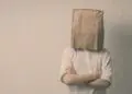 anonymous employee bag over head