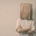 anonymous employee bag over head