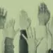 hands raised at meeting