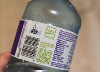 recycled materials label on plastic bottle
