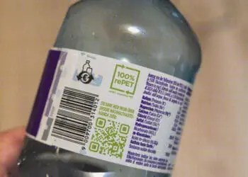 recycled materials label on plastic bottle