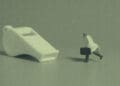 whistleblower concept figurine chasing whistle