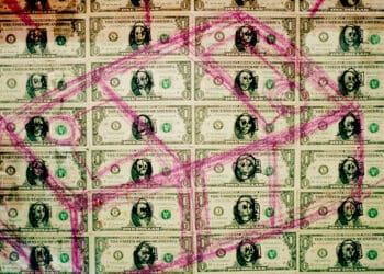 defaced money fraud concept