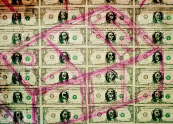defaced money fraud concept