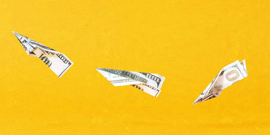 paper airplanes made out of currency