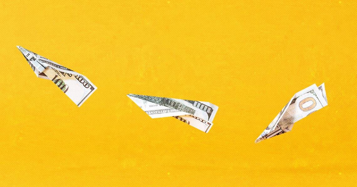 paper airplanes made out of currency