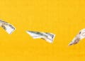 paper airplanes made out of currency