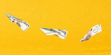 paper airplanes made out of currency