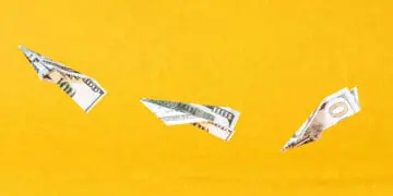 paper airplanes made out of currency