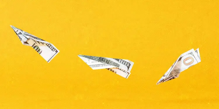 paper airplanes made out of currency